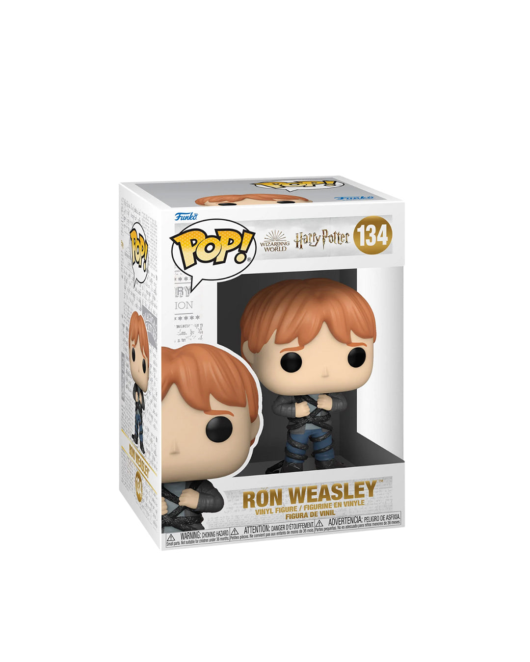 Figura Funko Pop de Ron Weasley (n.º 134) de Harry Potter, en su caja original con ventana transparente. La figura muestra a Ron con su característico atuendo de Hogwarts, incluyendo su túnica, bufanda de Gryffindor y varita, todo en estilo vinyl coleccionable visible a través del packaging.
